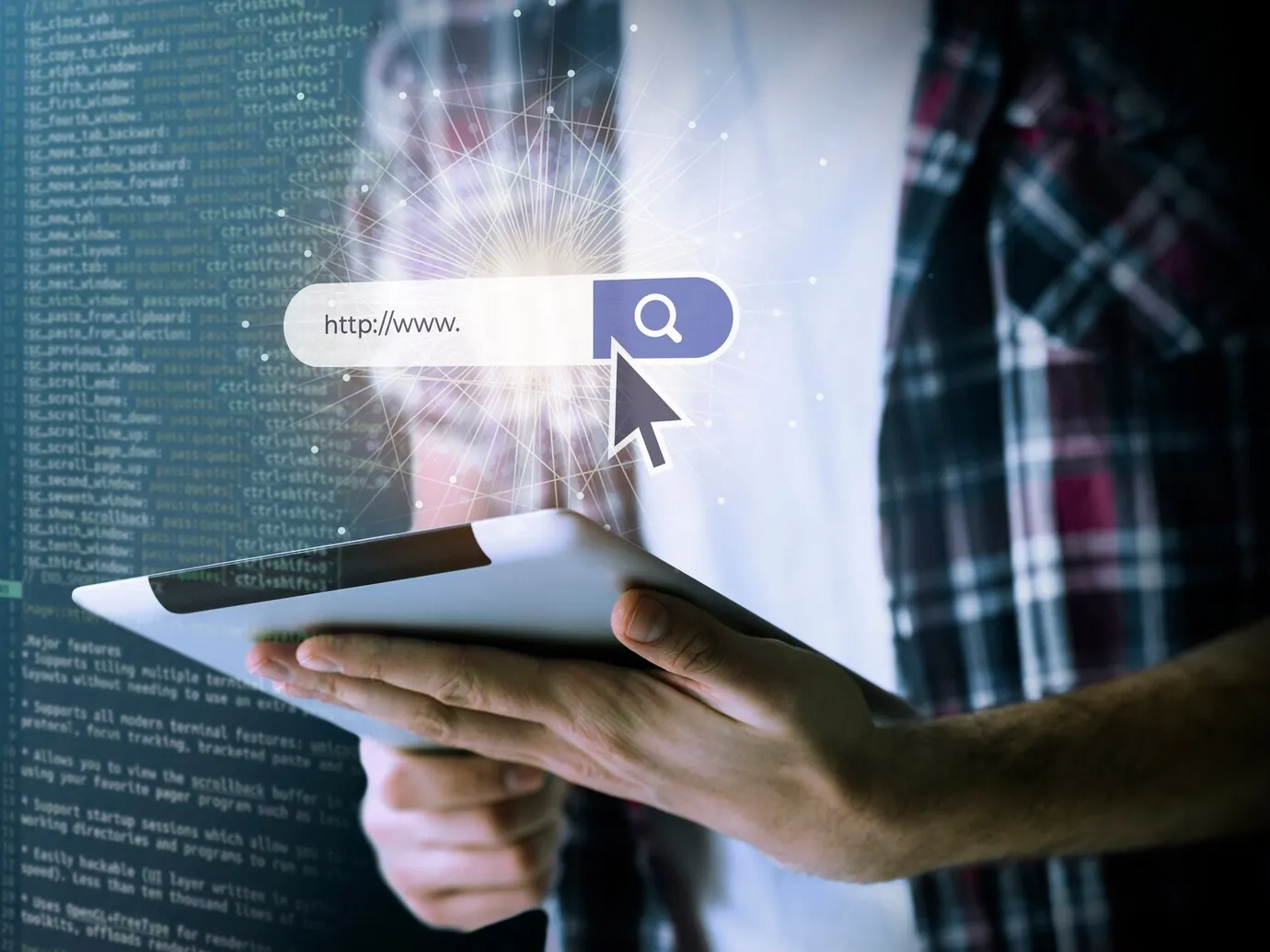 Case Study: Pearl Lemon's Conversion Copywriting for a Global Technology Conference 41 person-holding-a-tablet-with-a-search-bar-and-cursor-illustration-on-the-screen-against-a-background-of-code